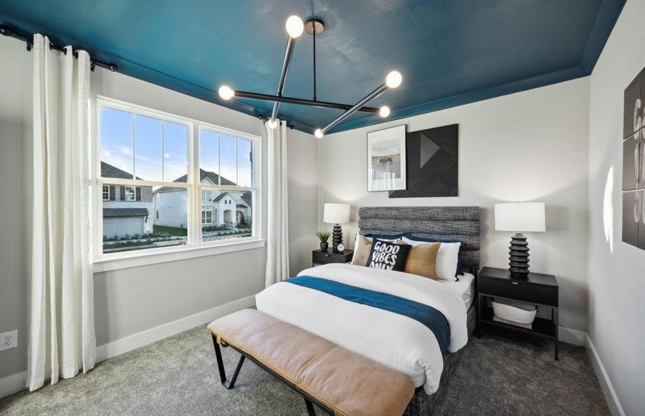 *Model Representation - Spacious secondary bedroom with large windows