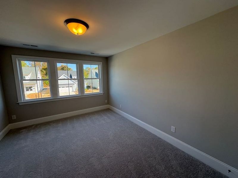 Spacious, unfurnished interior of a new home in Riverside Cove, Wilmington (Image 37).