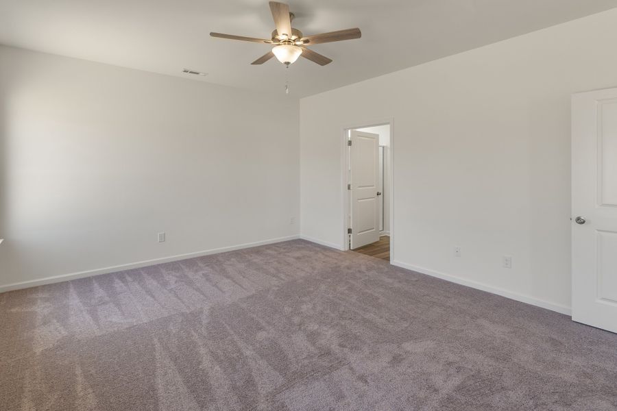 Spacious, unfurnished interior of a new home in The Exchange, Vass (Image 20).