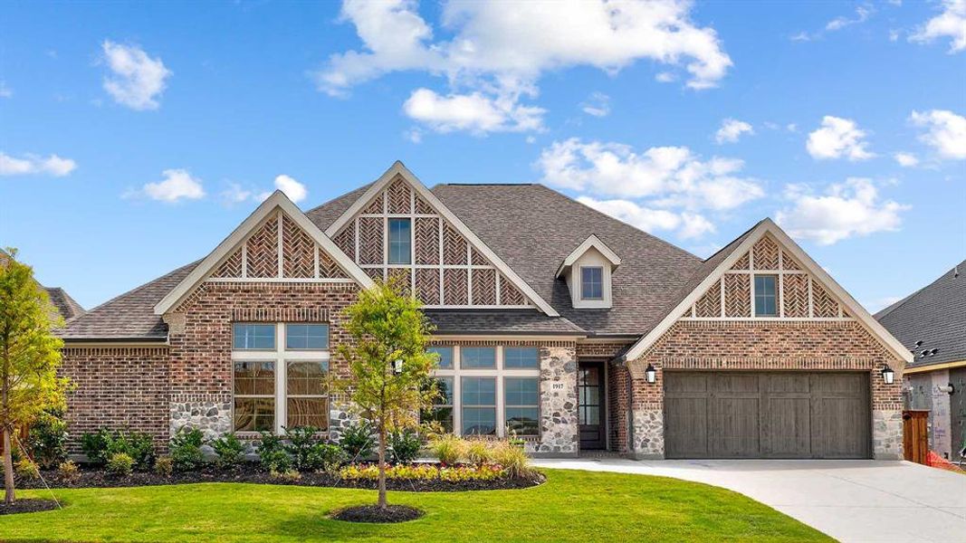 Front exterior of a new home in Terraces 72', Rockwall, TX, highlighting curb appeal (Image 1). Front exterior of a new home in Terraces 72', Rockwall, TX, highlighting curb appeal (Image 1).