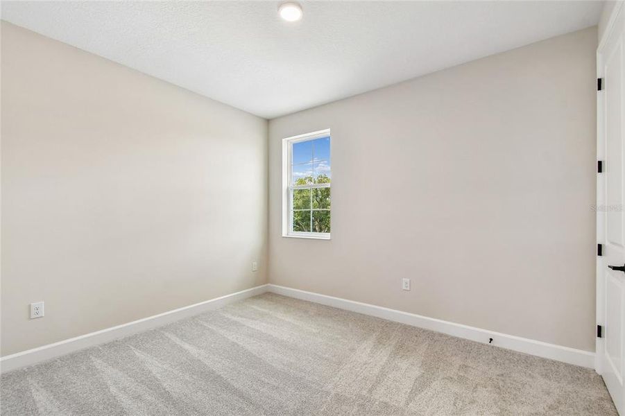 Spacious, unfurnished interior of a new home in Wolf Lake Ranch, Apopka (Image 11).