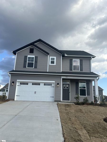 Front exterior of a new home in Shiloh Trail, Wellford, SC, highlighting curb appeal (Image 22).