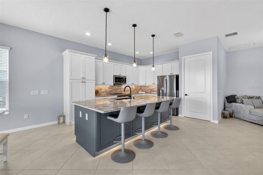 Furnished interior view inside a new home in , The Villages (Image 12).