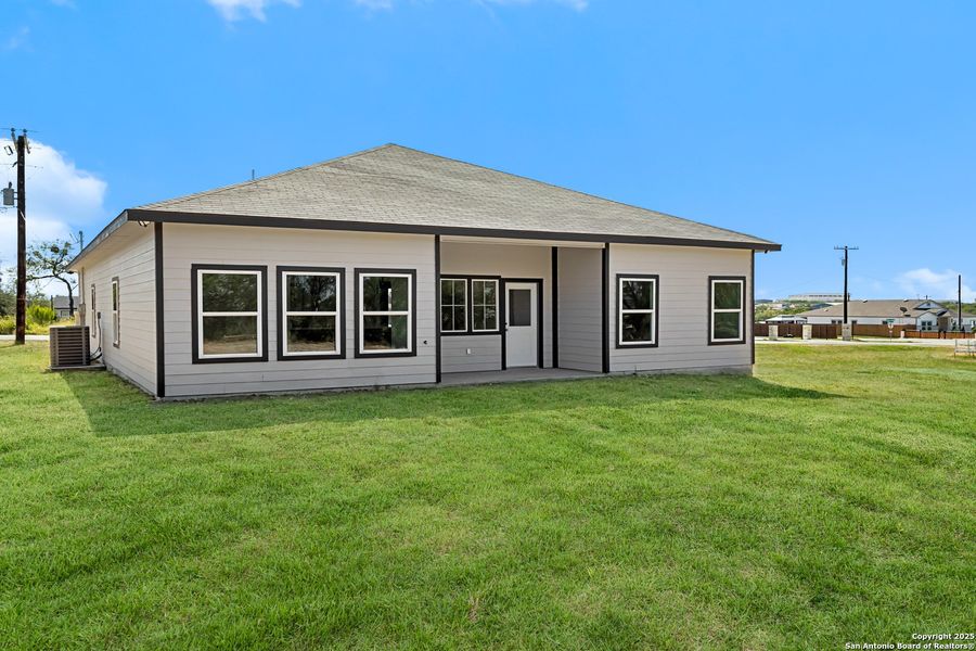 Front exterior of a new home in , San Antonio, TX, highlighting curb appeal (Image 17). Front exterior of a new home in , San Antonio, TX, highlighting curb appeal (Image 17).