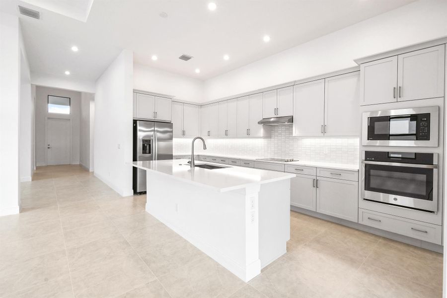 Furnished interior view inside a new home in PGA Village Verano, Port St. Lucie (Image 4).