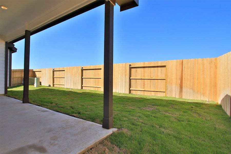 Exterior details and patio area of a home in Oakwood Estates, Waller (Image 21).