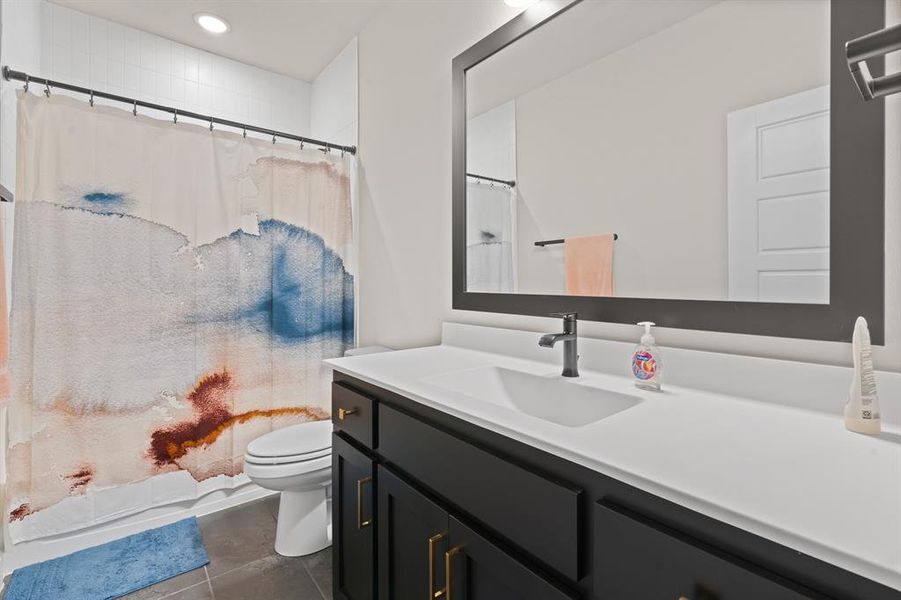 Furnished interior view inside a new home in Pecan Square - Estates, Northlake (Image 24).