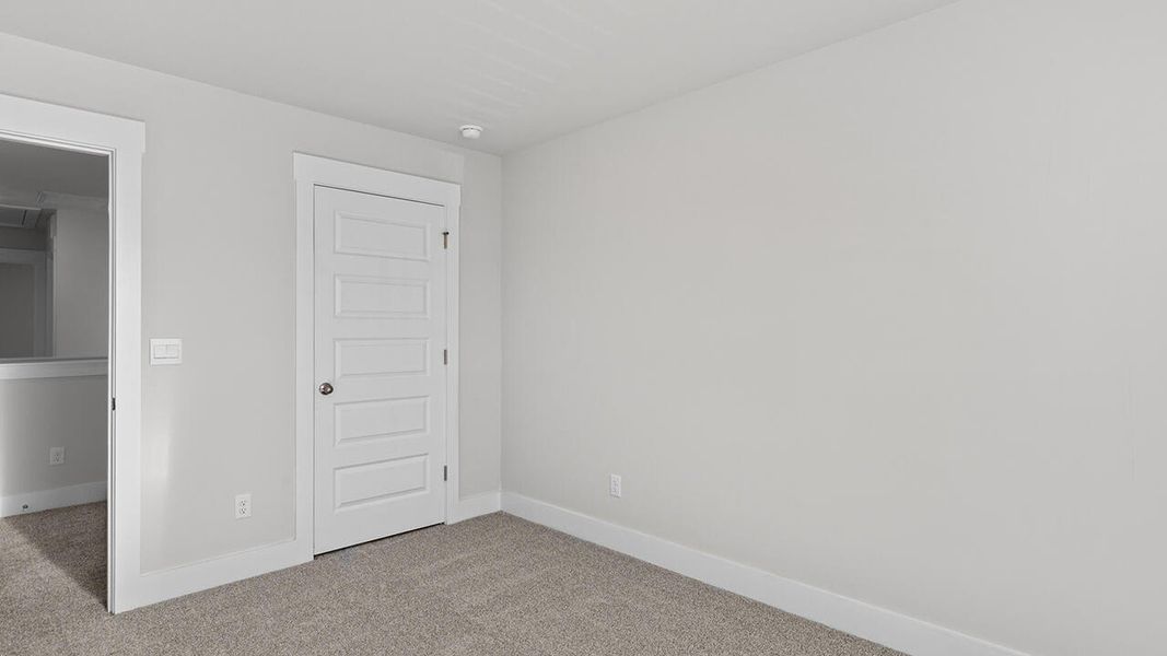 Spacious, unfurnished interior of a new home in The Haven at Indigo Preserve, Leland (Image 32).