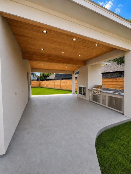 Huge outdoor patio and fireplace with outdoor kitchen. Large Back Yard. Photos are enhanced.