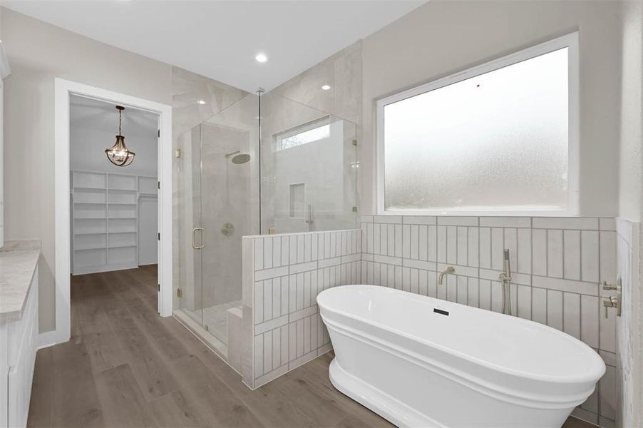 Walk in shower, soaker tub, and walk-in closet in your primary en-suite bathroom.