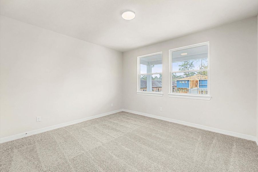 Spacious, unfurnished interior of a new home in Peacock Isle, Dickinson (Image 13).