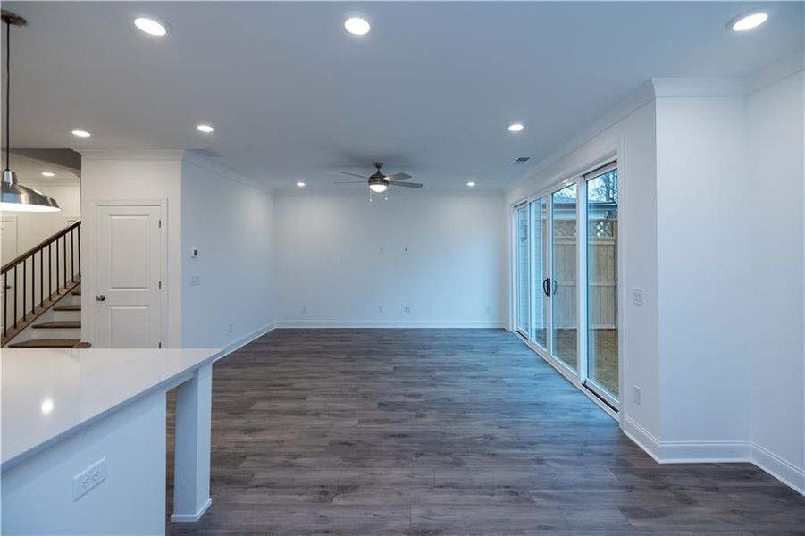 Family room view, sliding door will be 8ft. Pictures represent a previously built home not the actual home, home is under construction.