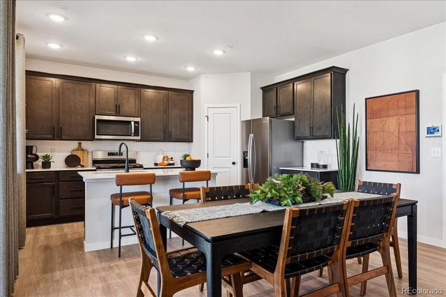 Furnished interior view inside a new home in Sweetgrass, Dacono (Image 10).