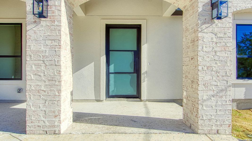 Exterior details and patio area of a home in , Spring Branch (Image 4).