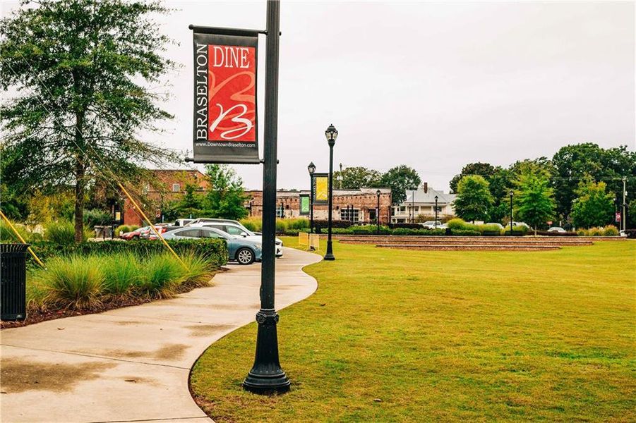 Front exterior of a new home in Rosewood Lake Estates, Hoschton, GA, highlighting curb appeal (Image 62).