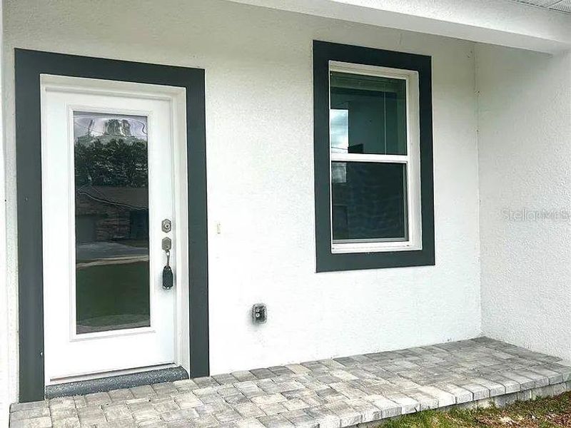 Exterior details and patio area of a home in , Ocala (Image 7).