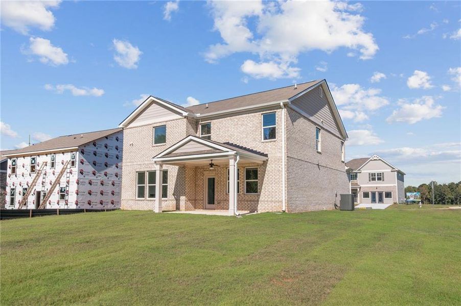 Exterior details and patio area of a home in The Brooke at Rivertown, South Fulton (Image 24).