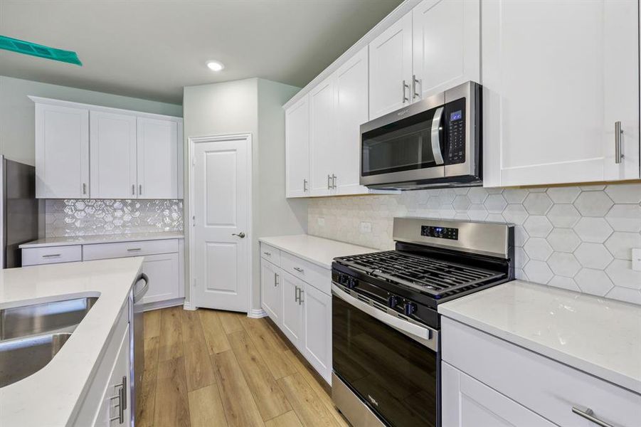 Photo is not of the actual home, but is an inspirational photo of builder’s model home and may depict options, furnishings, and/or decorator features that are not included.