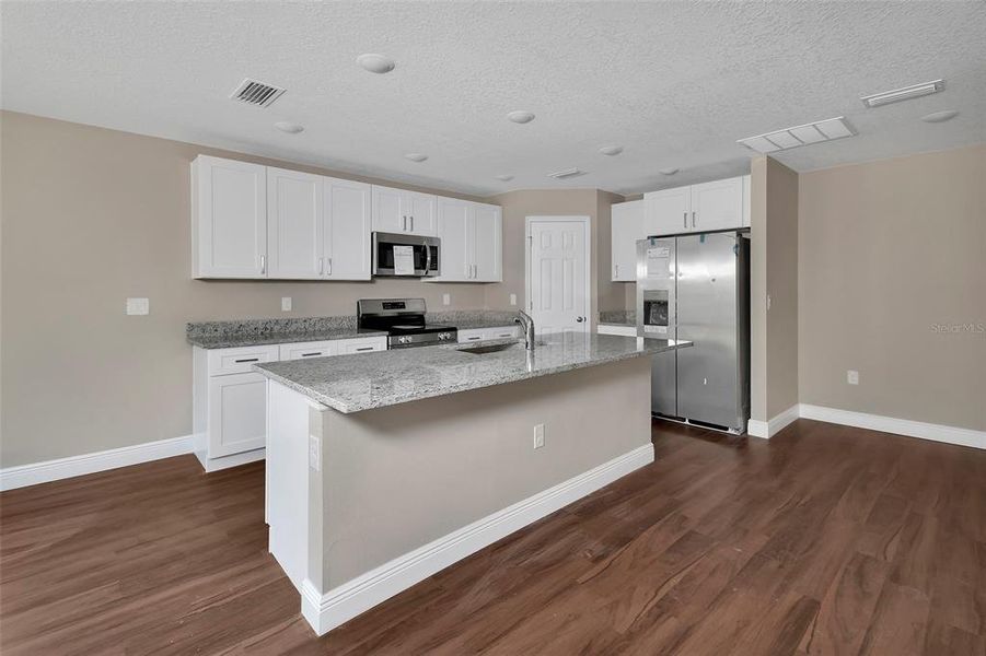 Furnished interior view inside a new home in , Daytona Beach (Image 8). Furnished interior view inside a new home in , Daytona Beach (Image 8).