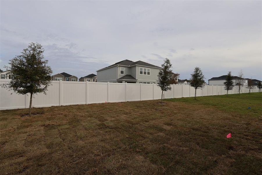 Exterior details and patio area of a home in Estates at Rivercrest, Sanford (Image 14). Exterior details and patio area of a home in Estates at Rivercrest, Sanford (Image 14).