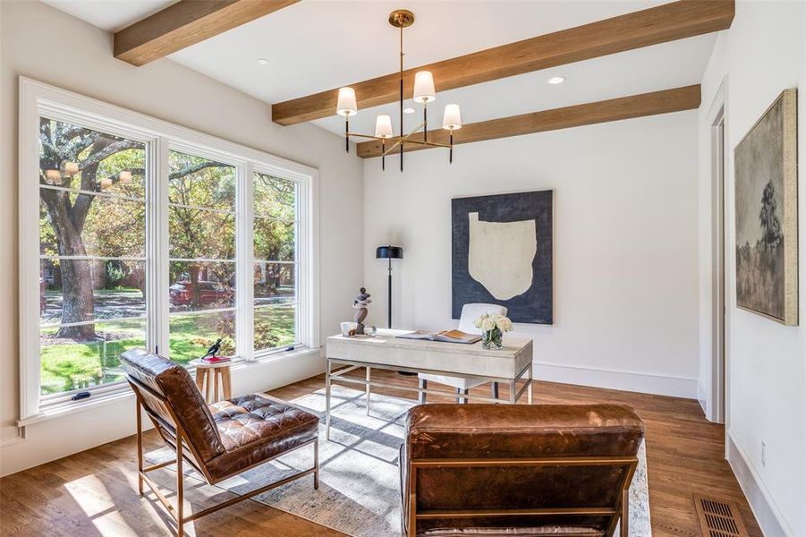 Home office with a chandelier, wood finished floors, beamed ceiling, and recessed lighting Home office with a chandelier, wood finished floors, beamed ceiling, and recessed lighting