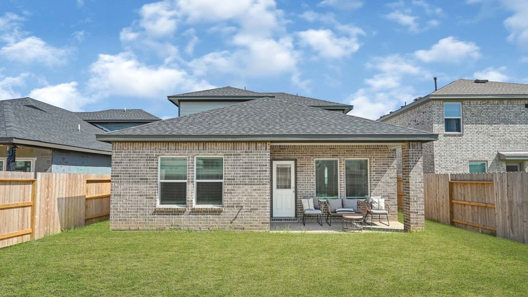 Exterior details and patio area of a home in Emberly, Beasley (Image 21).