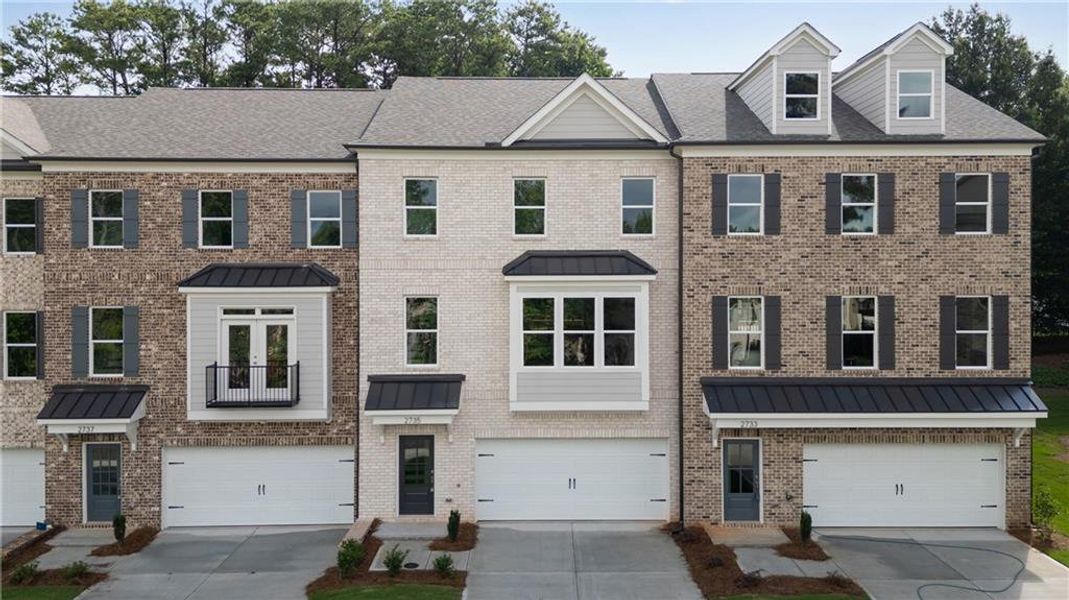 Front exterior of a new home in , Suwanee, GA, highlighting curb appeal (Image 1). Front exterior of a new home in , Suwanee, GA, highlighting curb appeal (Image 1).