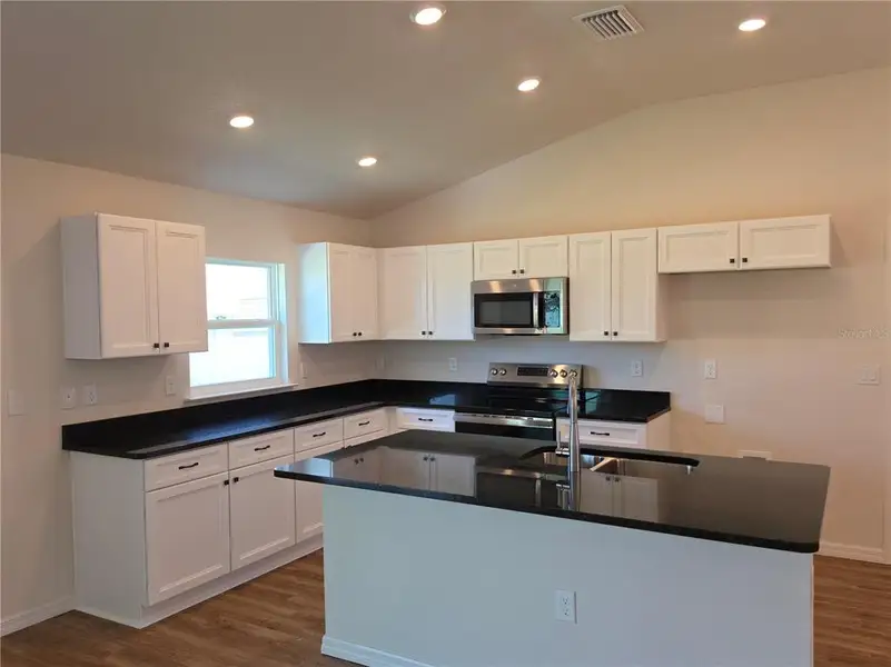 Furnished interior view inside a new home in , Citrus Springs (Image 6).