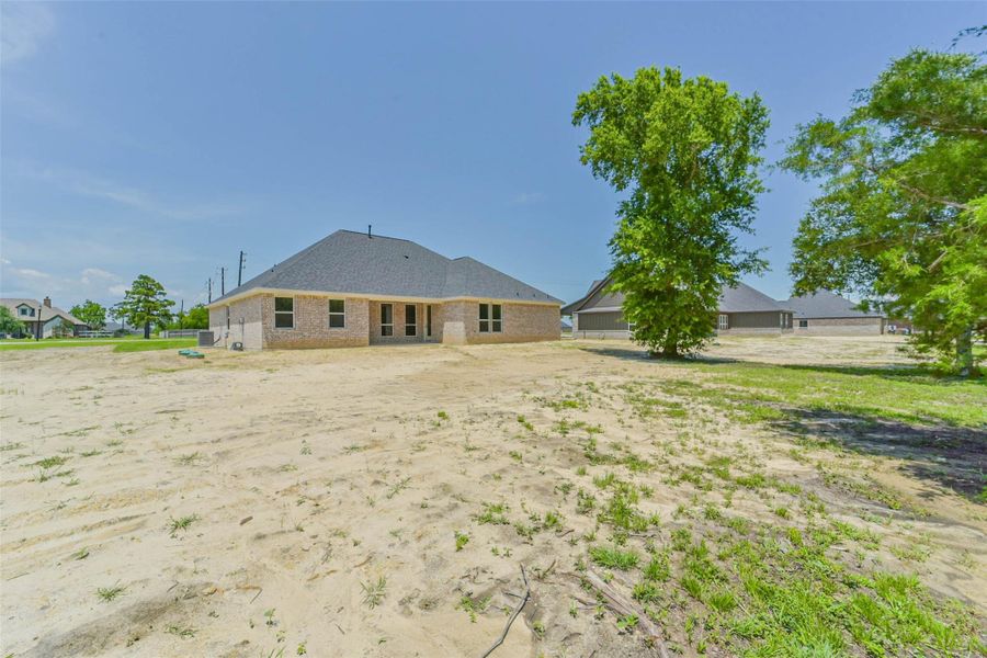 Exterior details and patio area of a home in , Baytown (Image 4).