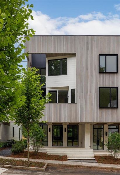 Front exterior of a new home in , Chattahoochee Hills, GA, highlighting curb appeal (Image 16).