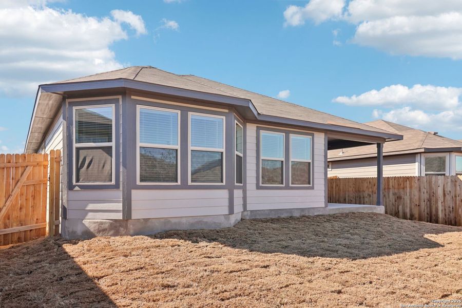 Exterior details and patio area of a home in Catalina, Converse (Image 18).