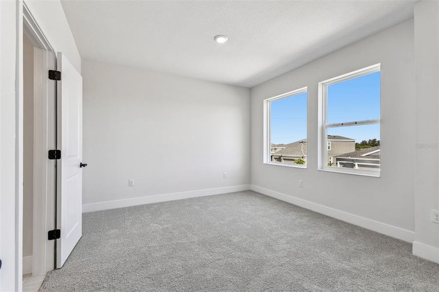 Spacious, unfurnished interior of a new home in Waterset Tradition Series, Apollo Beach (Image 40).