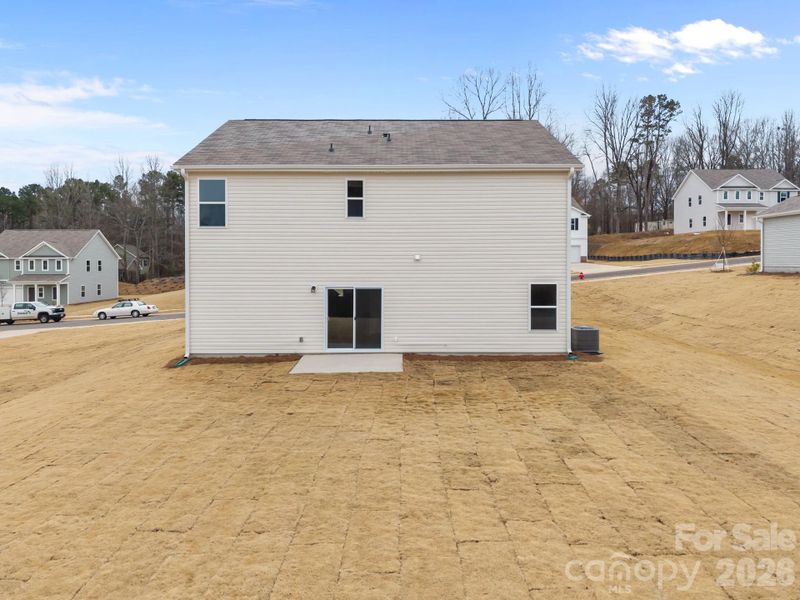Exterior details and patio area of a home in Fisher Springs, Kannapolis (Image 12).