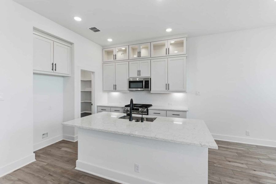 Furnished interior view inside a new home in Centero at Stone Oak, San Antonio (Image 5).