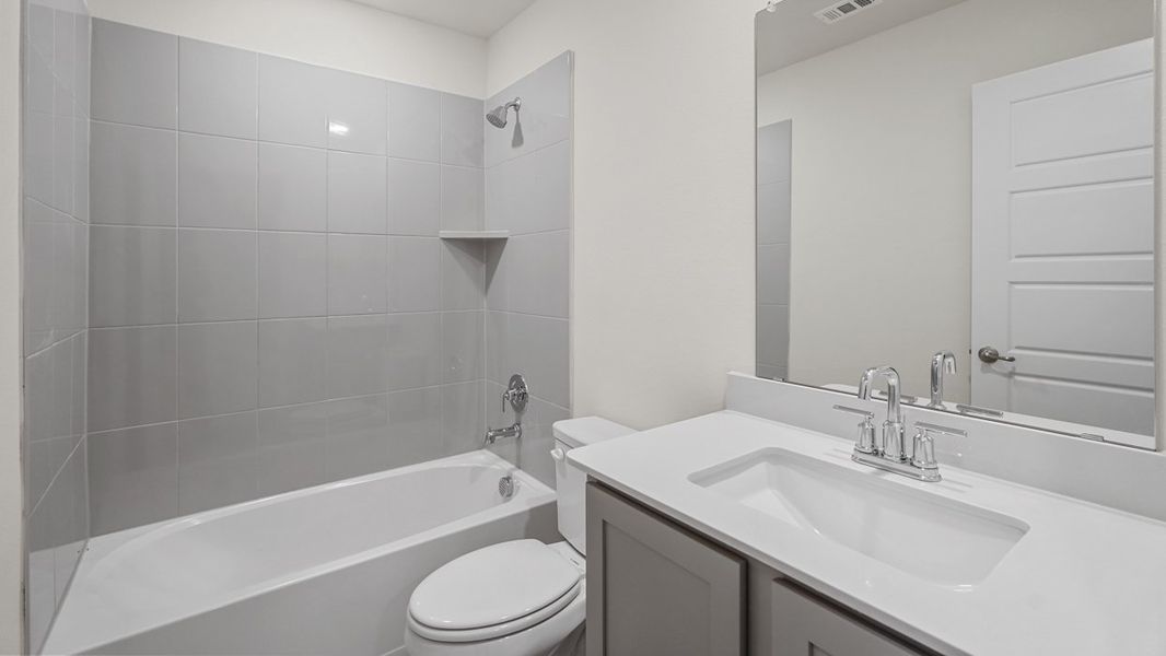 Furnished interior view inside a new home in Woodcreek, Fate (Image 7).