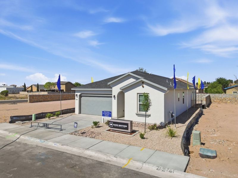 Representative exterior photo of a completed home built from the Santa Rosa by Hakes Brothers in Paseo Del Este, El Paso, TX (Image 22).