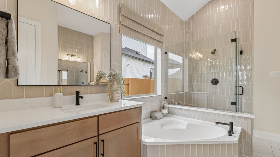 Representative furnished interior of a home built from the Rosewood by DRB Homes in Revelry, Del Valle (Image 28).