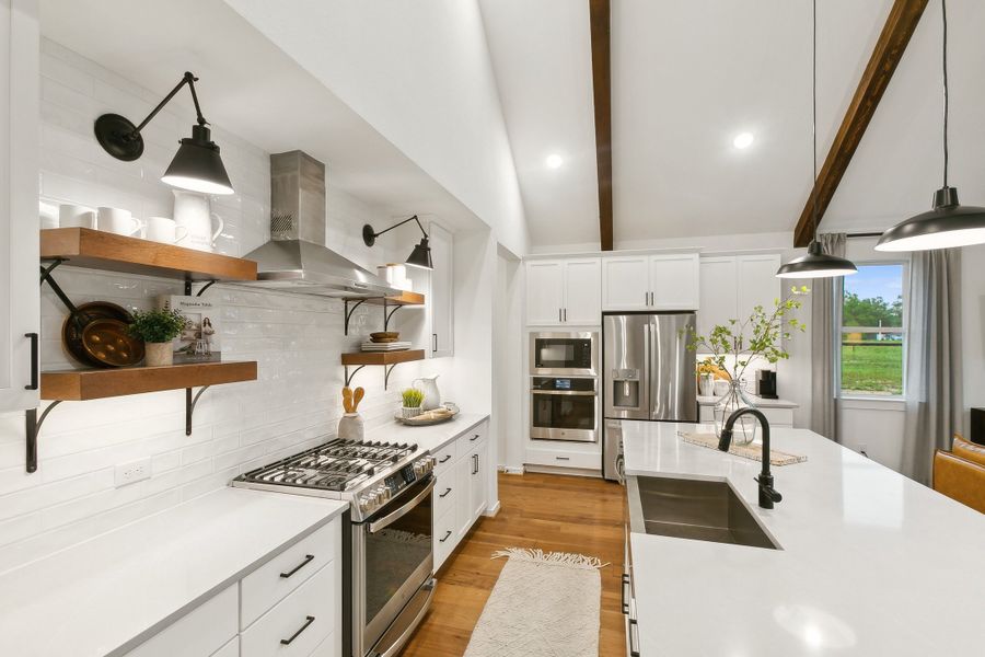 Kitchen with pendant lighting and subway tile backsplash Kitchen with pendant lighting and subway tile backsplash