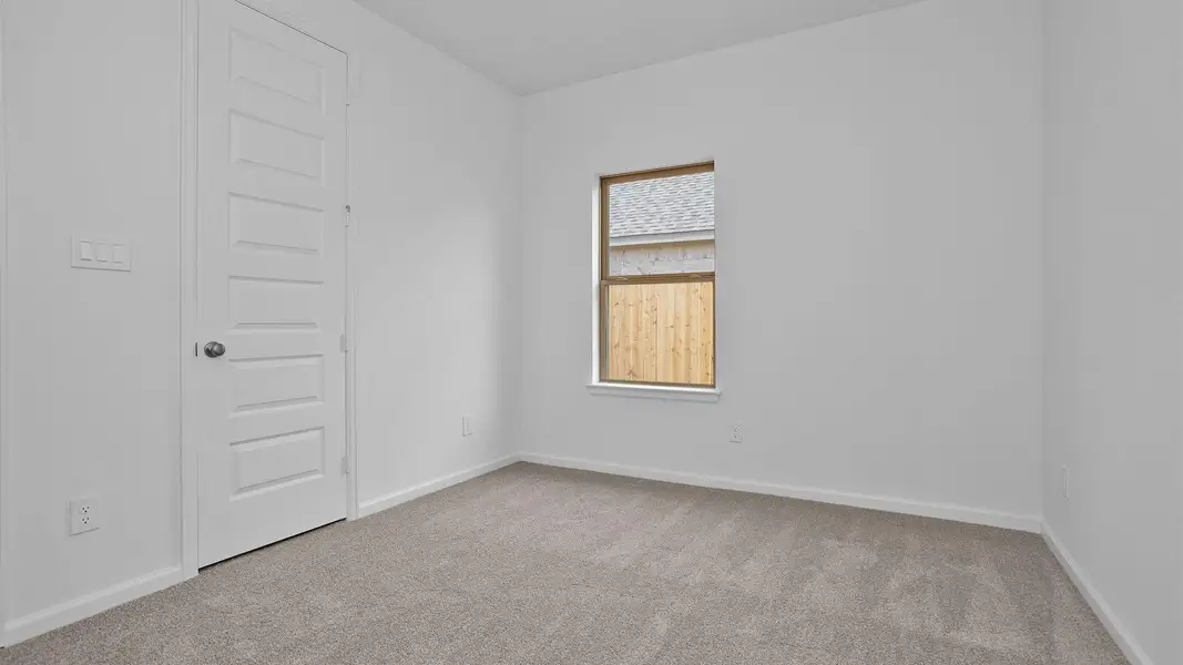 Spacious, unfurnished interior of a new home in Meridiana, Manvel (Image 6).