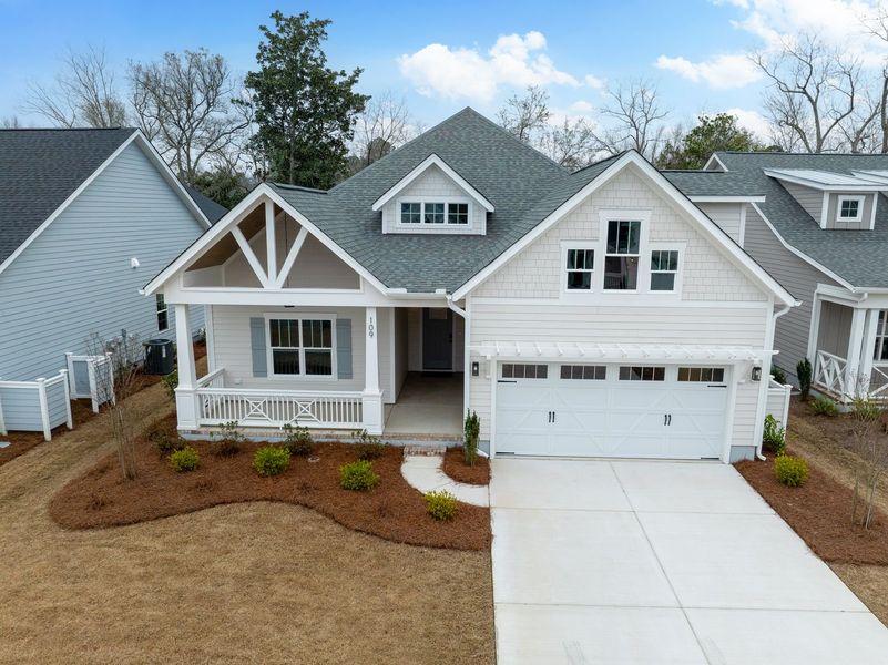 Representative exterior photo of a completed home built from the Kauai by Bill Clark Homes in The Sanctuary at Sunset Beach, Sunset Beach, NC (Image 33).