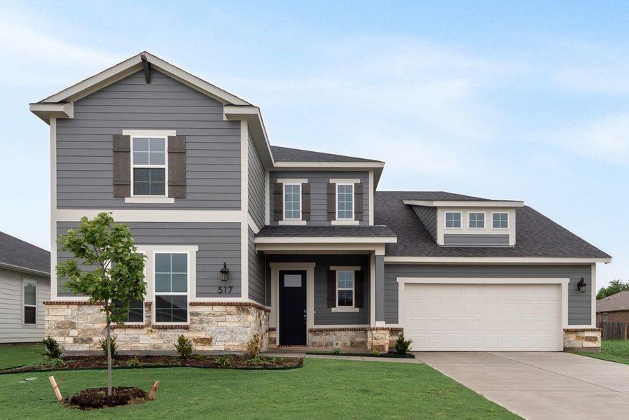 Front exterior of a new home in Creekside of Crowley, Crowley, TX, highlighting curb appeal (Image 22). Front exterior of a new home in Creekside of Crowley, Crowley, TX, highlighting curb appeal (Image 22).