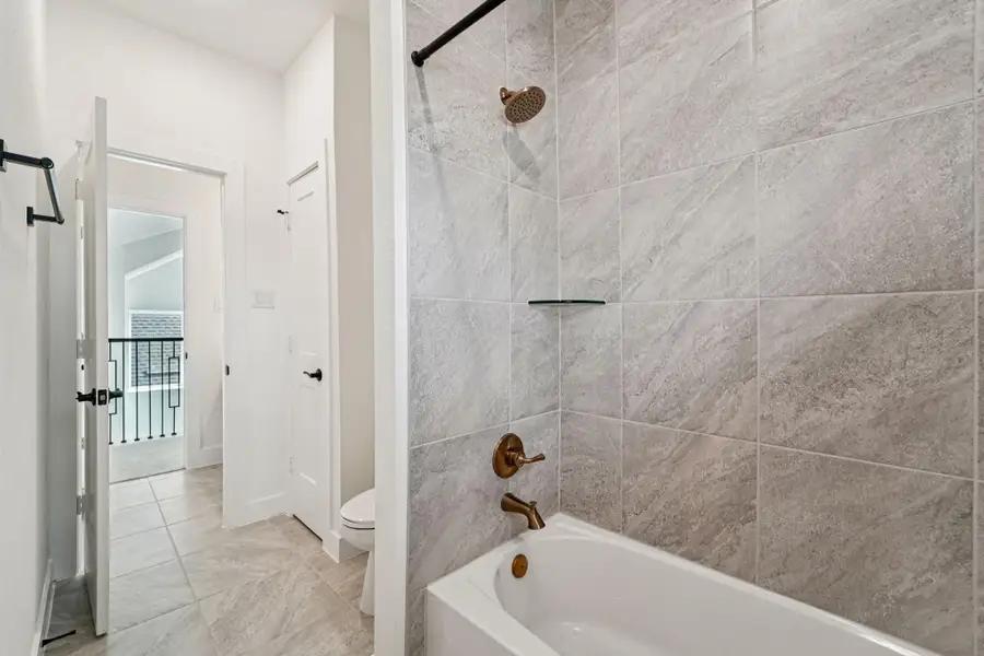 Furnished interior view inside a new home in The Woodlands Hills, Willis (Image 10).