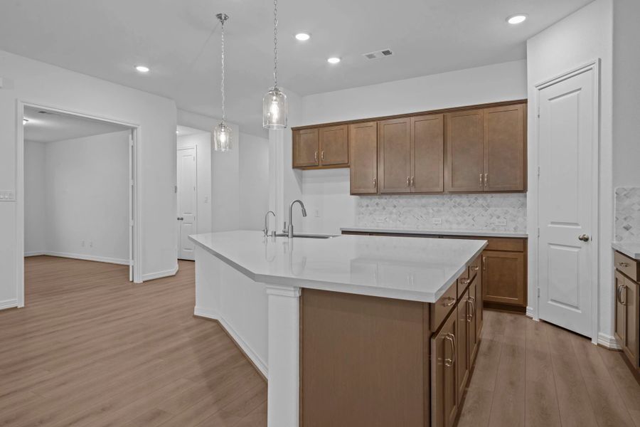 Kitchen. Sample product photo. Actual exterior and interior selections may vary by homesite. Photo may be virtually staged.