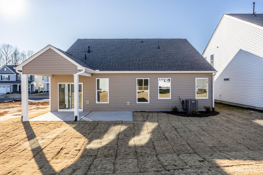 Exterior details and patio area of a home in 1158 Place, Wilson (Image 4).