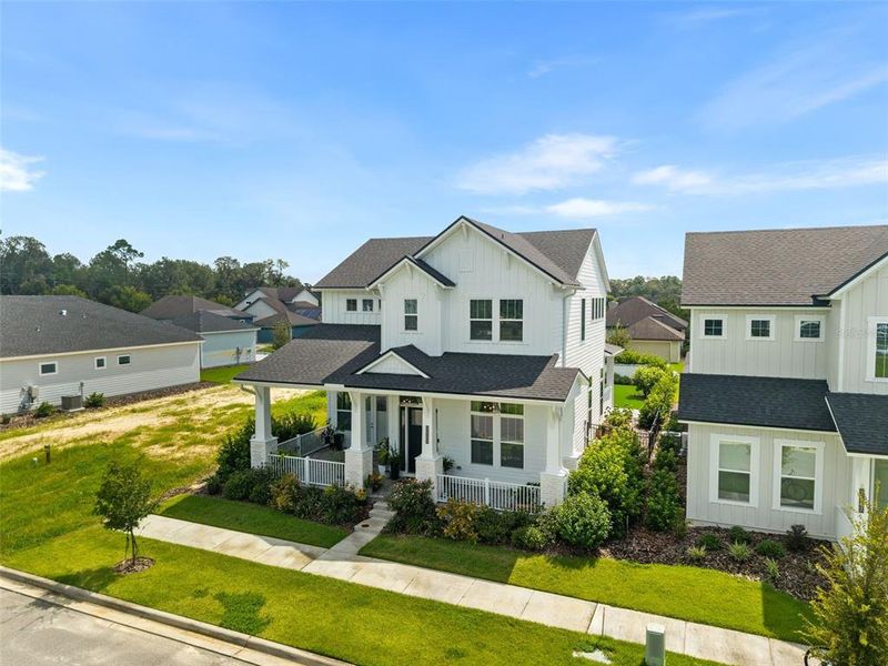 Front exterior of a new home in Oakmont, Gainesville, FL, highlighting curb appeal (Image 25). Front exterior of a new home in Oakmont, Gainesville, FL, highlighting curb appeal (Image 25).