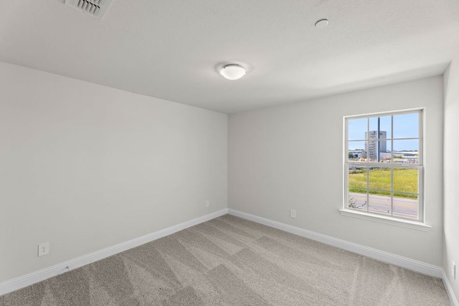 Front exterior of a new home in Main Street Village, Mansfield, TX, highlighting curb appeal (Image 23).