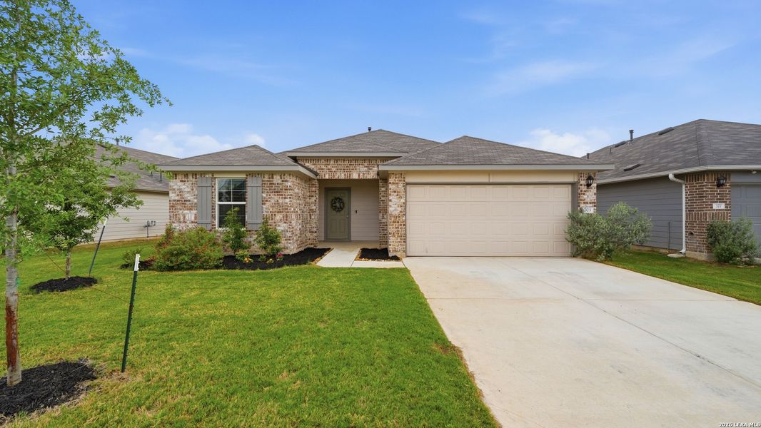 Front exterior of a new home in Heather Glen, New Braunfels, TX, highlighting curb appeal (Image 29).