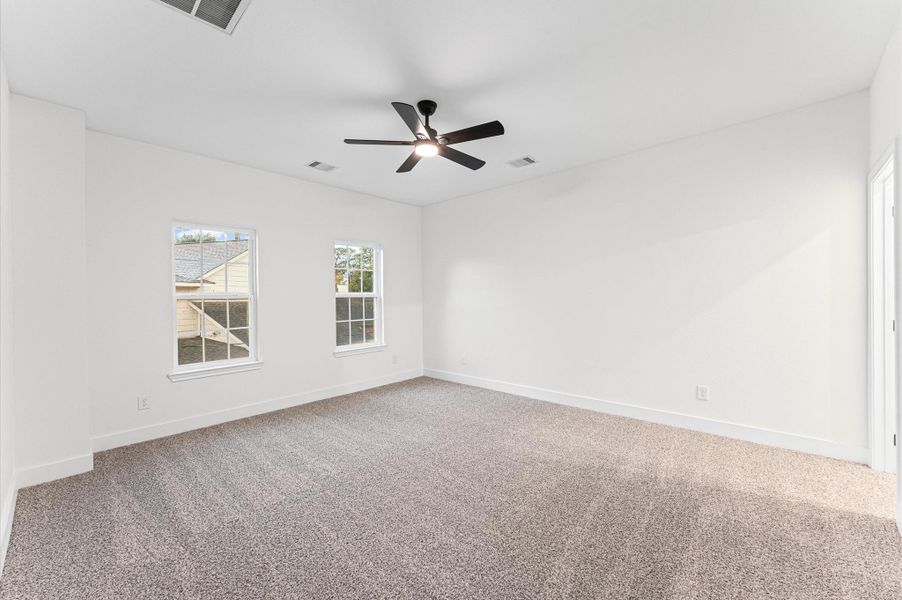 Second bedroom. Extra-large secondary bedroom with a walk-in closet, big windows, and plush comfort. Second bedroom. Extra-large secondary bedroom with a walk-in closet, big windows, and plush comfort.