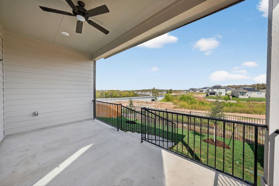 Balcony featuring a ceiling fan and a residential view Balcony featuring a ceiling fan and a residential view