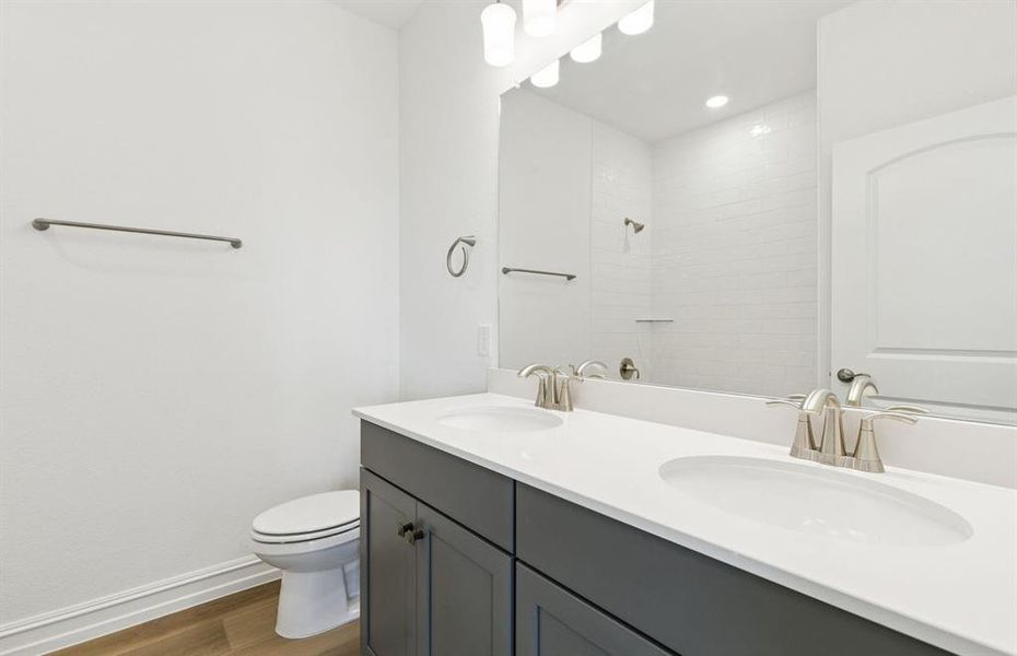 Spacious secondary bathroom with double vanity Spacious secondary bathroom with double vanity